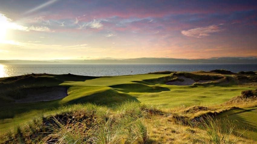 A view of the ocean from a golf course.