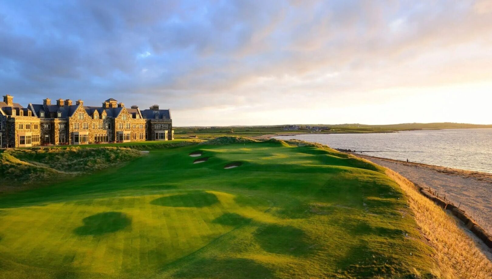 A view of the golf course from across the water.