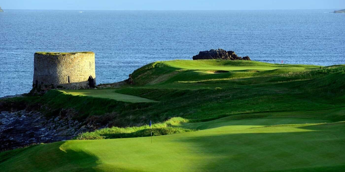 A view of the ocean from behind a green.